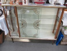 A glass front display cabinet