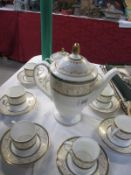 A nice 8 place tea set incuding teapot etc