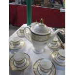 A nice 8 place tea set incuding teapot etc