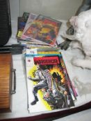 A collection of comics including Eternal Warrior, Hard Case,
