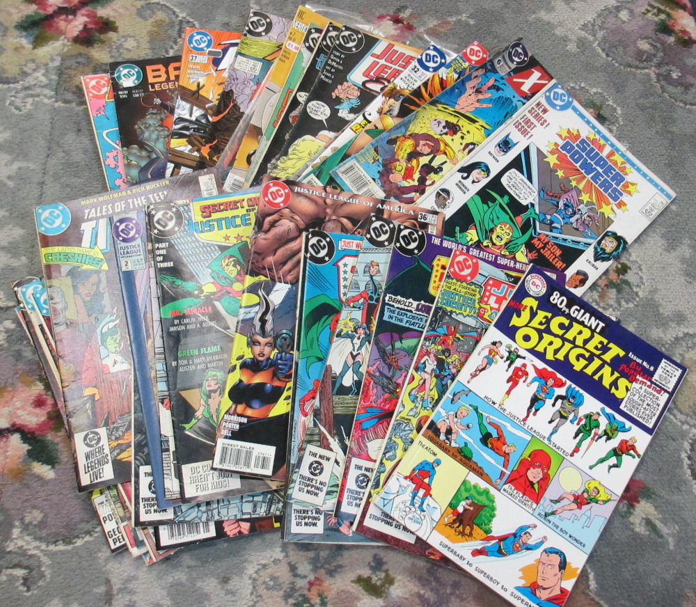 A good collection of DC comics including Secret Origins, Justice League, Teen Titans,