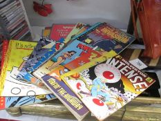 A good collection of cartoon books and comics including Wolverson and George Herriman