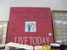 A canvas print saying Cherish Yesterday Dream Tomorrow