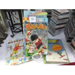 A collection of annuals including Beano and Rupert