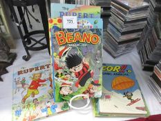 A collection of annuals including Beano and Rupert