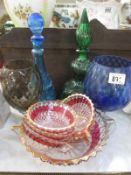 A quantity of coloured glass items