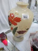 A painted glass vase