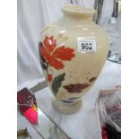 A painted glass vase