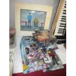 A collection of boxed Star Trek figurines and a Star Trek cartoon cell featuring Spock and Captain