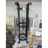 A metal umbrella stand