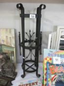 A metal umbrella stand