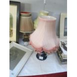 Three table lamps with shades