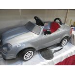 A childs toy ride in sports car