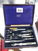 A cased Rowney protractor set