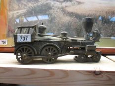 A heavy metal model of a steam engine
