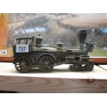 A heavy metal model of a steam engine