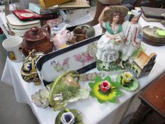 A collection of pottery and figures including Staffordshire