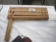 A wooden clacker