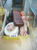A small box of miscellaneous items including small doll etc