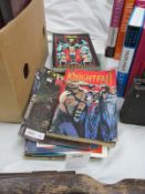 A collection of comics and graphic novels including Batman Knightfall, Griffin,