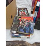 A collection of comics and graphic novels including Batman Knightfall, Griffin,