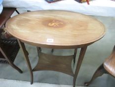 An oval occassional table