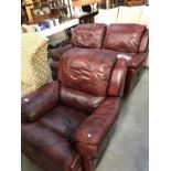 A red leather 2 seater settee & chair (all electric recliners)