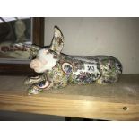A Chinese Famile Rose style model of a pig signed underneath