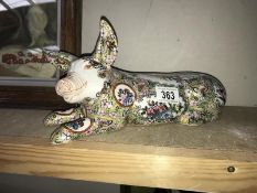 A Chinese Famile Rose style model of a pig signed underneath