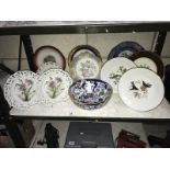 A quantity of collectors plates including ribbon plates