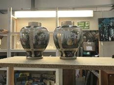 A pair of mid 20th century German vases with various 18th century scenes