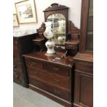 A darkwood dressing table