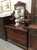 A darkwood dressing table