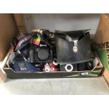 A box of cameras and accessories