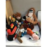 A quantity of Disney related soft toys including Mickey,