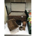 A wicker picnic hamper and other cane and wooden items