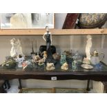 A quantity of misc. items including the 3 Graces, Lilliput Lane, silver plate, paperweight etc.