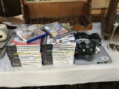 A Play Station 2 console and quantity of play station 2 games etc.