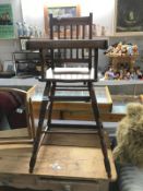 A 1930's oak metamorphic childs highchair