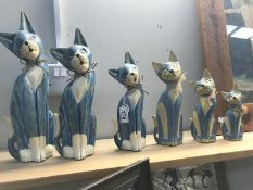 2 sets of 3 graduating wooden cats