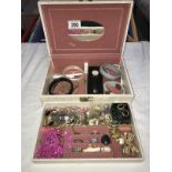 A good box of costume jewellery including a silver bracelet
