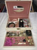 A good box of costume jewellery including a silver bracelet