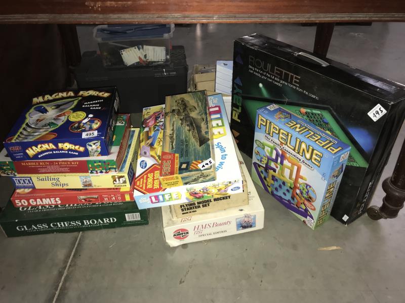 Quantity of mixed games including chess set, jigsaws, model kits etc.