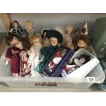 A box of porcelain and other dolls etc.