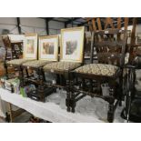 A set of 1930's tapestry print oak chairs