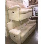 A cream 3 seater and 2 seater sofa with recliner