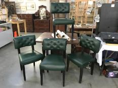 A set of 4 green vinyl covered chairs with deep button backs and an Edwardian oak drop leaf table