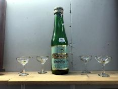 A large Babycham money bank in shape of a bottle and 4 Babycham glasses