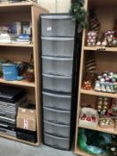 2 sets of 4 drawer plastic storage units