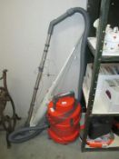 A Vax hoover/washer vacuum and a Bissell magic broom